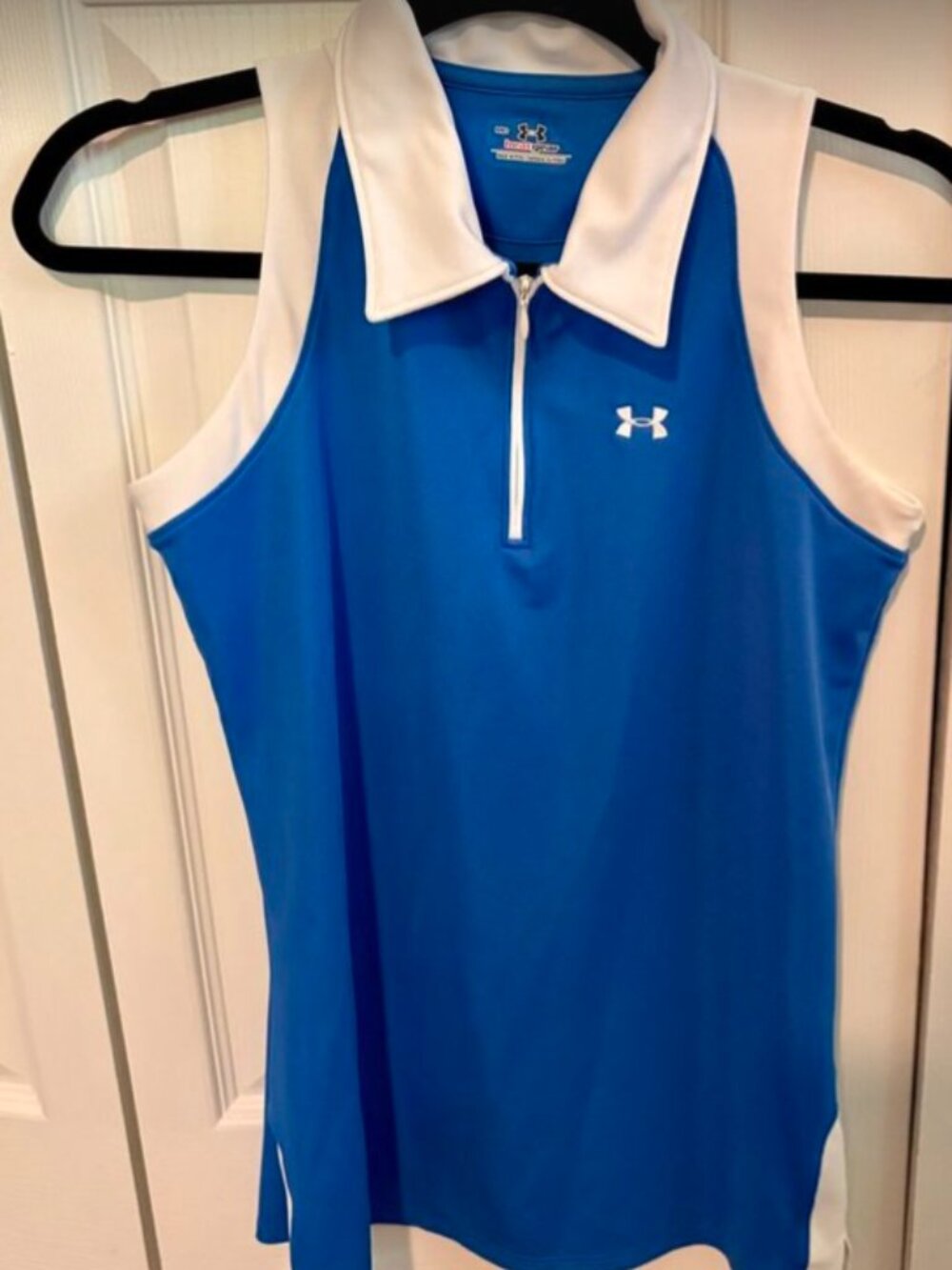 Blue Under Armour sleeveless golf shirt size medium